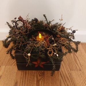 Festive Holiday Candle Centerpiece with Greenery and Rustic Accents